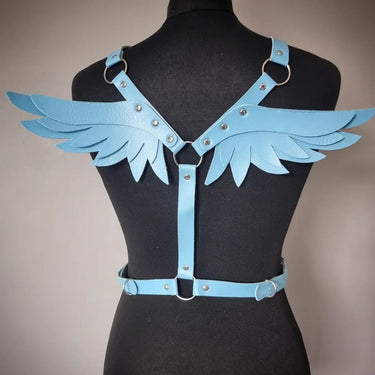Baby blue faux leather angel wing body harness with silver O-rings and stud accents on mannequin.