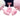 Pink silicone anal plug with fluffy bunny tail close-up detail view.
