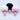 Pink silicone anal plugs with white and pink fluffy bunny tails close-up top view.