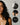 Before use hair comparison showing model with frizzy hair.