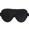 Oversized black silk sleep eye mask front view on white background.