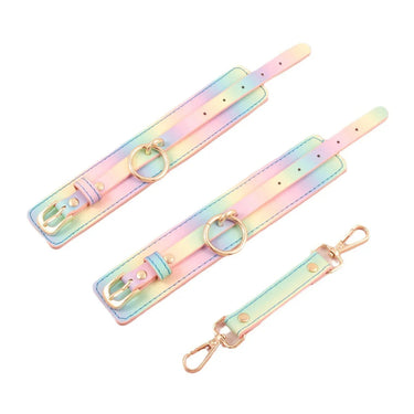 Side view of pastel rainbow cuffs showing rose gold swivel clasps and connector bar detail.