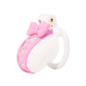 Pink and white sissy chastity cage with decorative bow accent and white base ring, shown on white background.