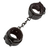 Black plush padded wrist cuffs connected by chain link, shown as a pair on white background.