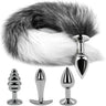 Gray and white fox tail butt plug with three silver metal anal plugs in small medium and large sizes product flat lay.