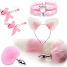 Pink and white fox tail plug kit with cat ear headband fluffy collar and nipple clamps flat lay.