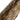 Close-up of natural brown fox fur tail showing texture and color variation.